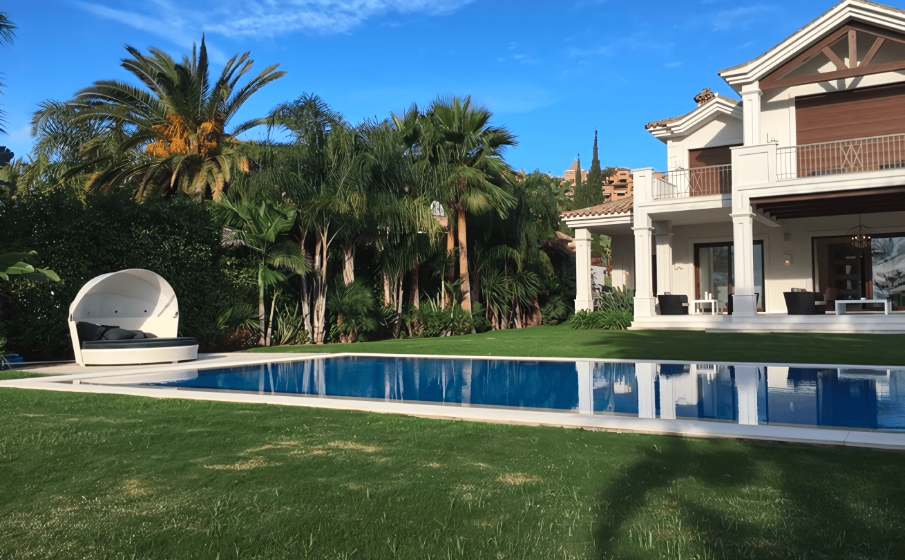 Terraced garden with pool and stone retaining walls at La Cerquilla estate.